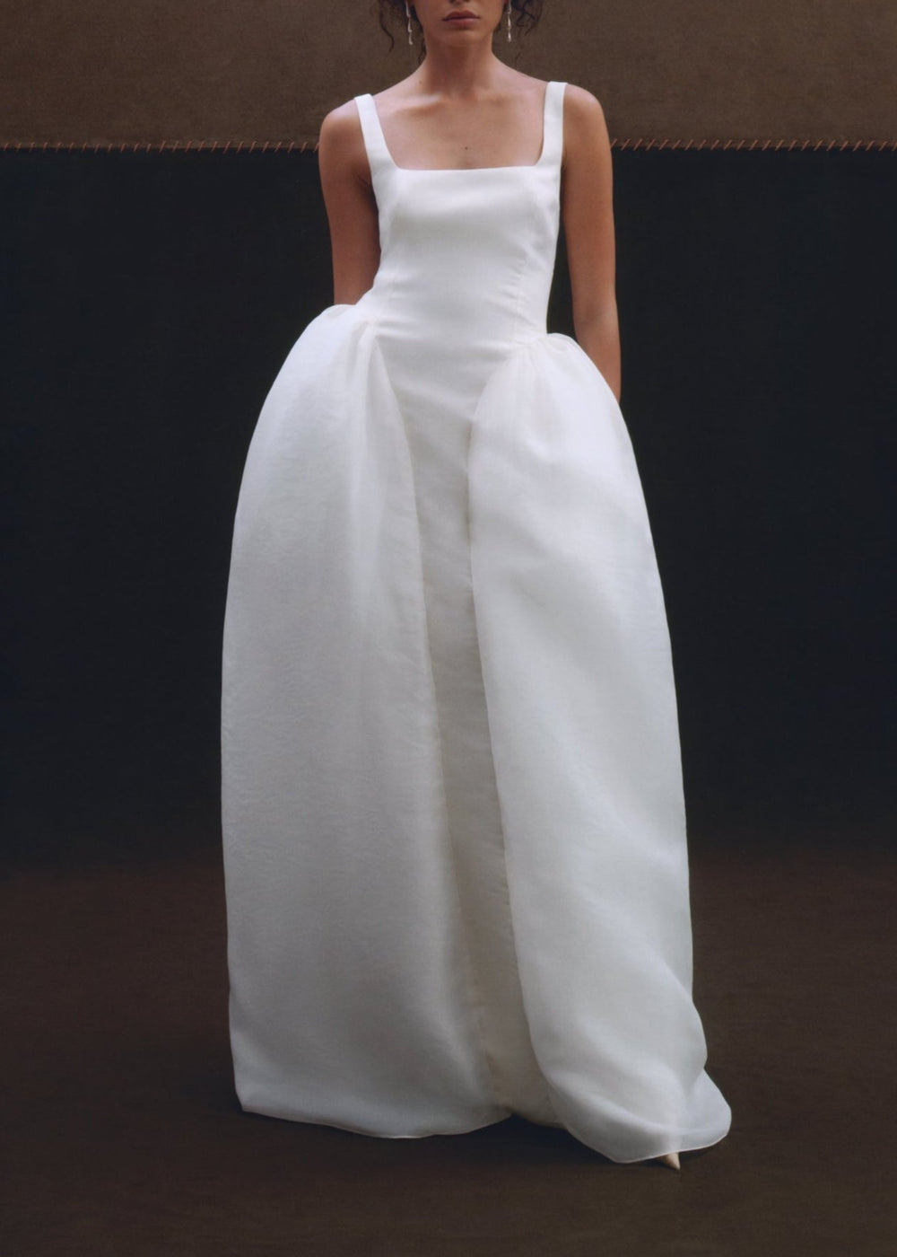 Front view of the white Eloise Gown showcasing its square neckline, fitted waist, and full skirt on a model