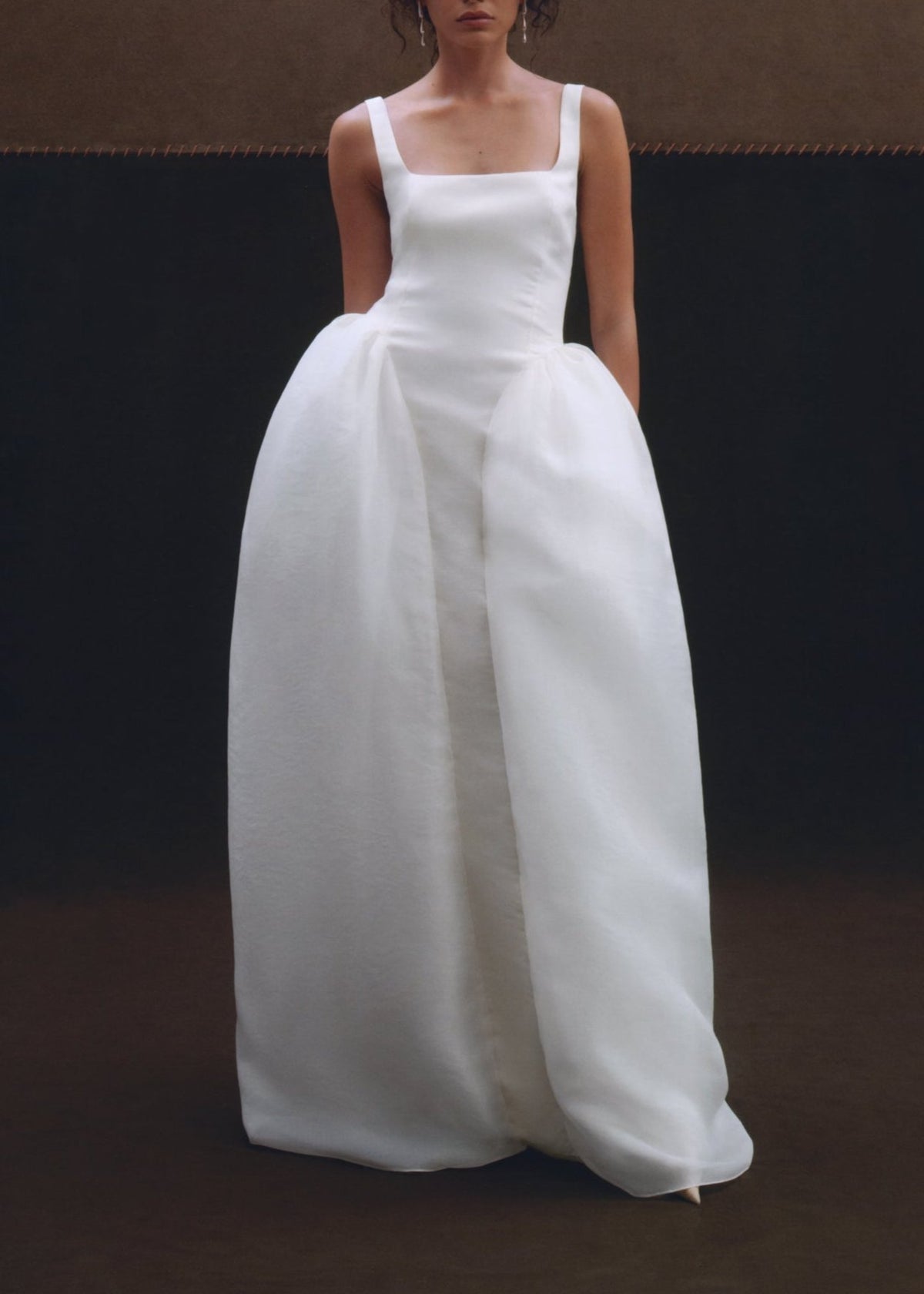 Front view of the white Eloise Gown showcasing its square neckline, fitted waist, and full skirt on a model