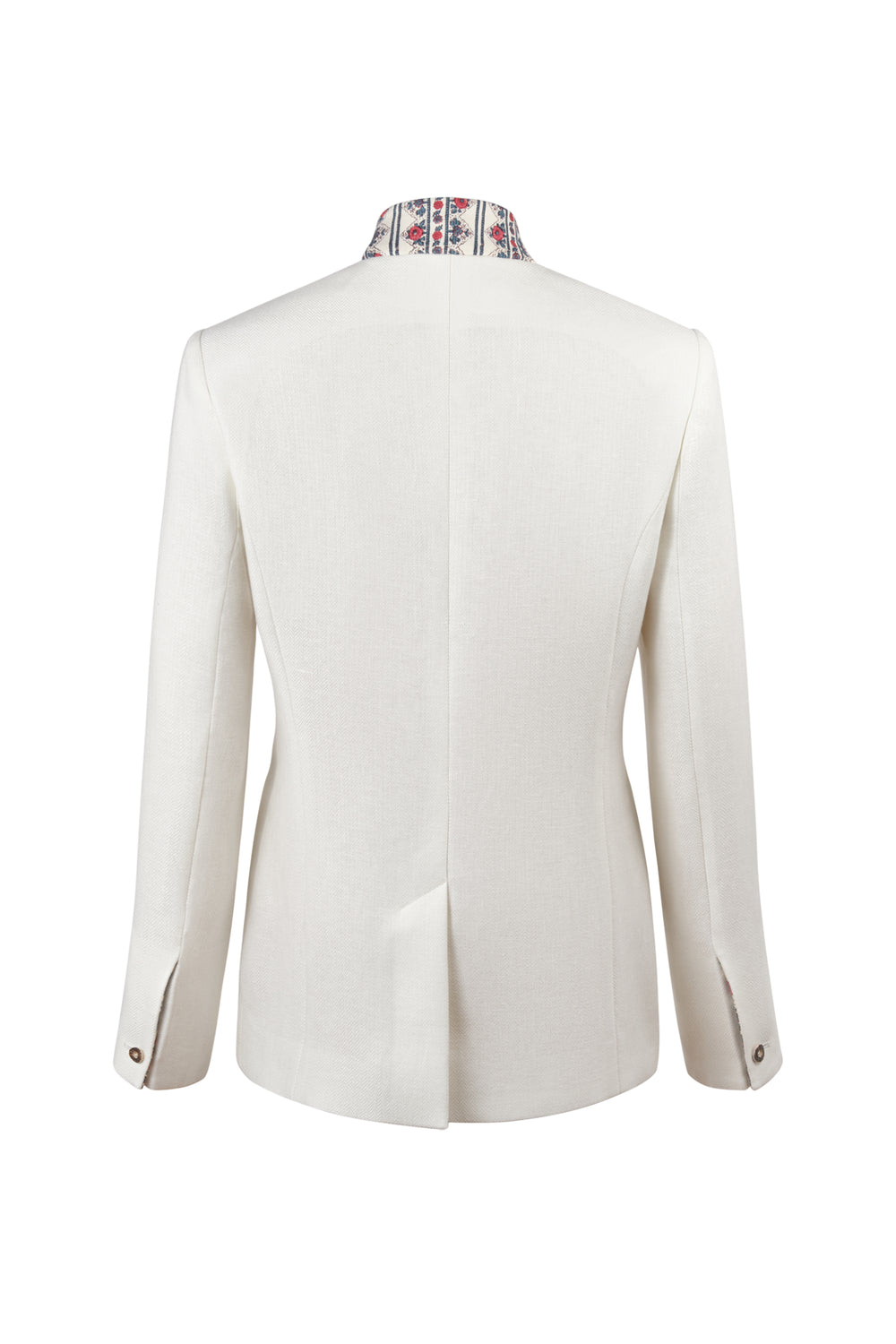Back view of Louise Alpin linen jacket with tailored silhouette, center back vent, horn-button cuffs and patterned collar