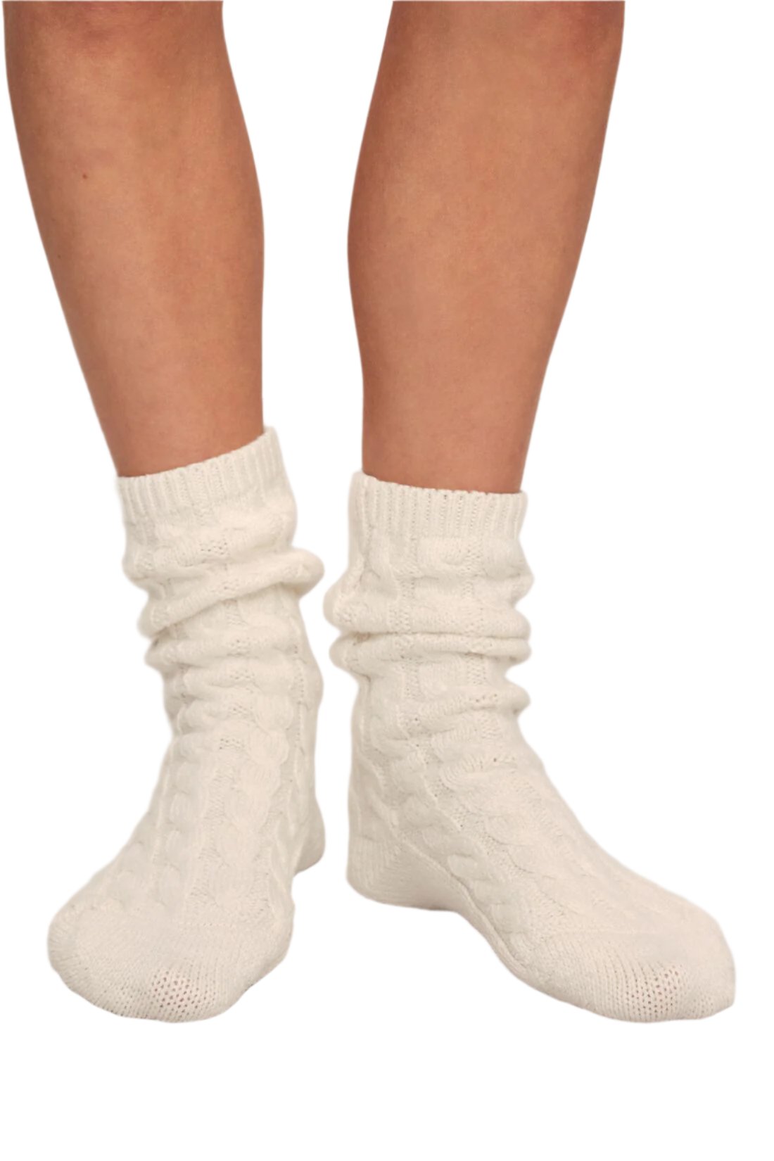 Front view of ivory Cozy Sock showcasing crew length and textured knit on a model against a white background