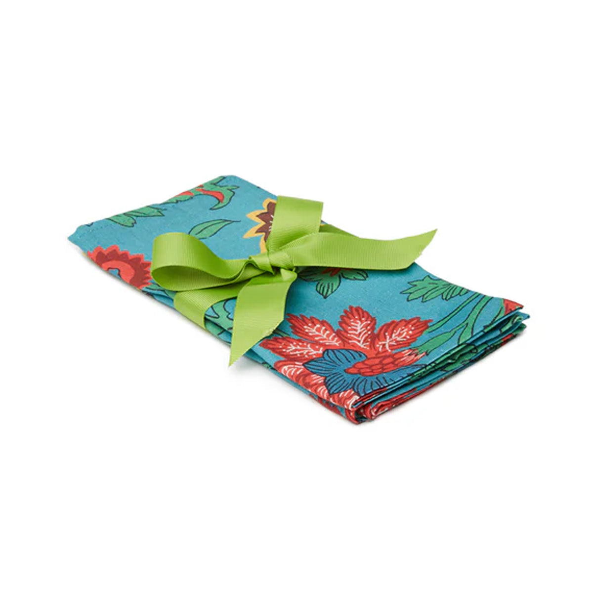 Angled view of Large Napkins in Dragon Flower Turquoise, Set of 2 showcasing bright floral print and green ribbon on white background