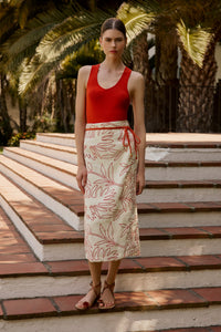 Beige midi skirt with bold red tropical leaf embroidery