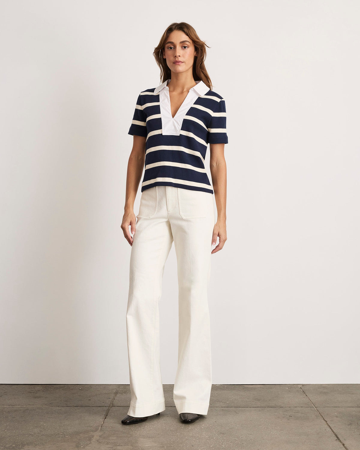 Front of Melanie Top in Maritime Blue and Cream Wide stripe on model, contrasting white V neck, short sleeves, relaxed fit