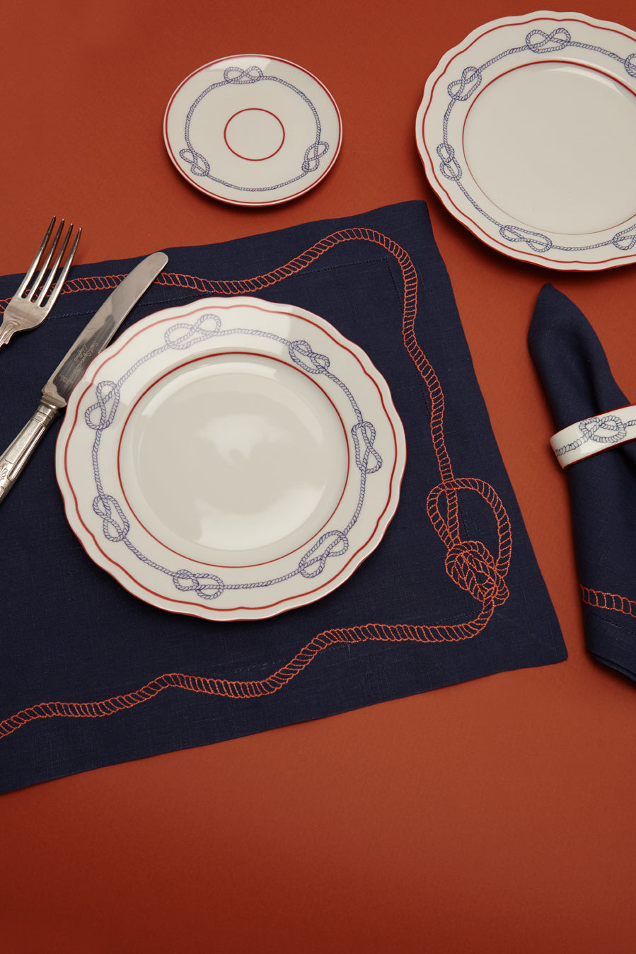 Bowline Linen Placemat in Navy with Blood Orange