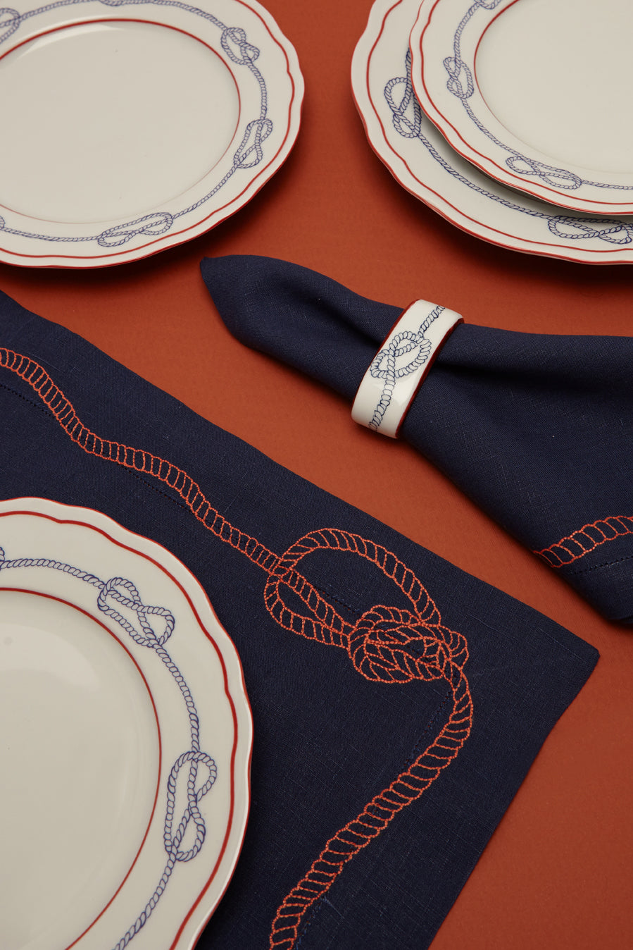 Bowline Linen Placemat in Navy with Blood Orange
