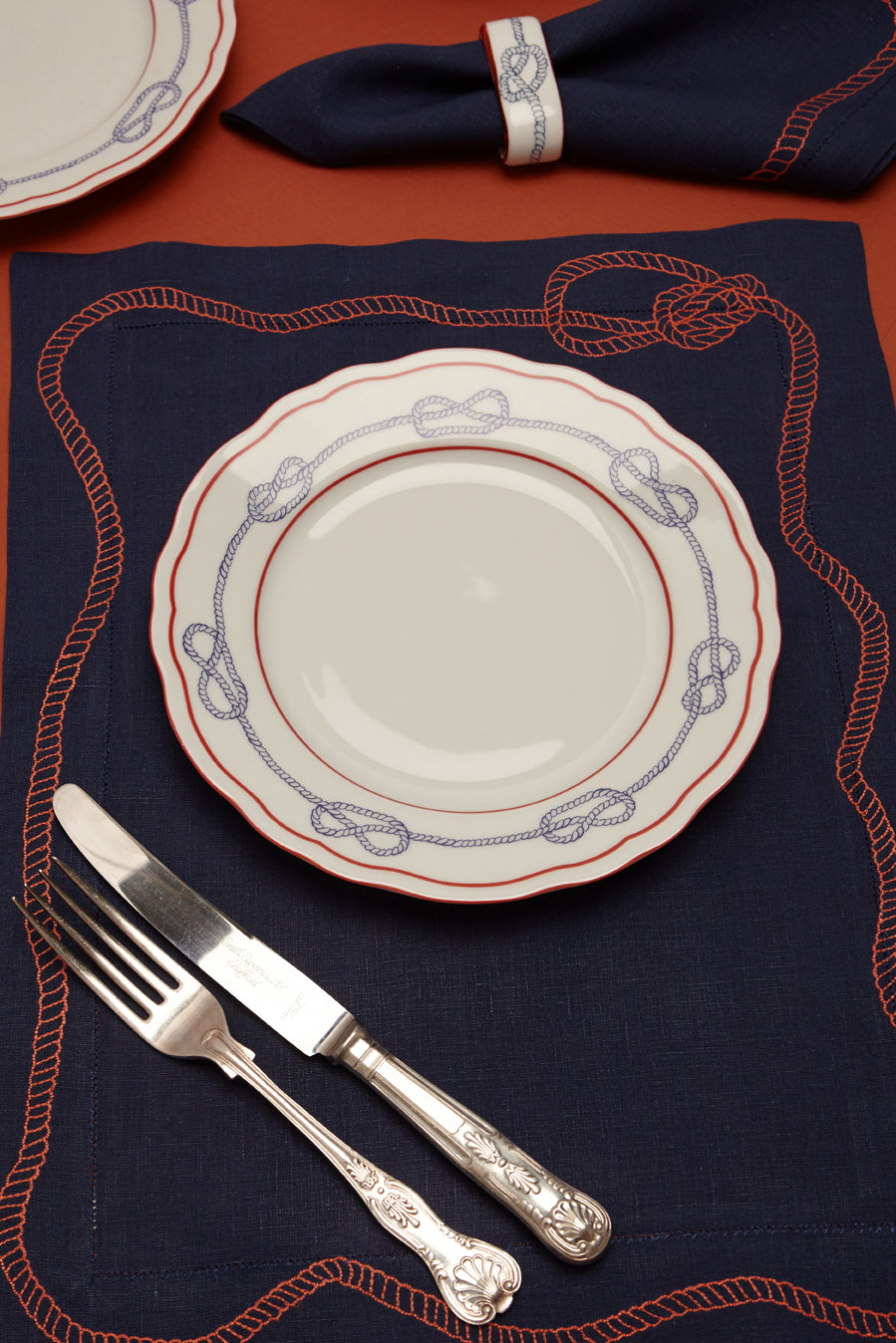 Bowline Linen Placemat in Navy with Blood Orange