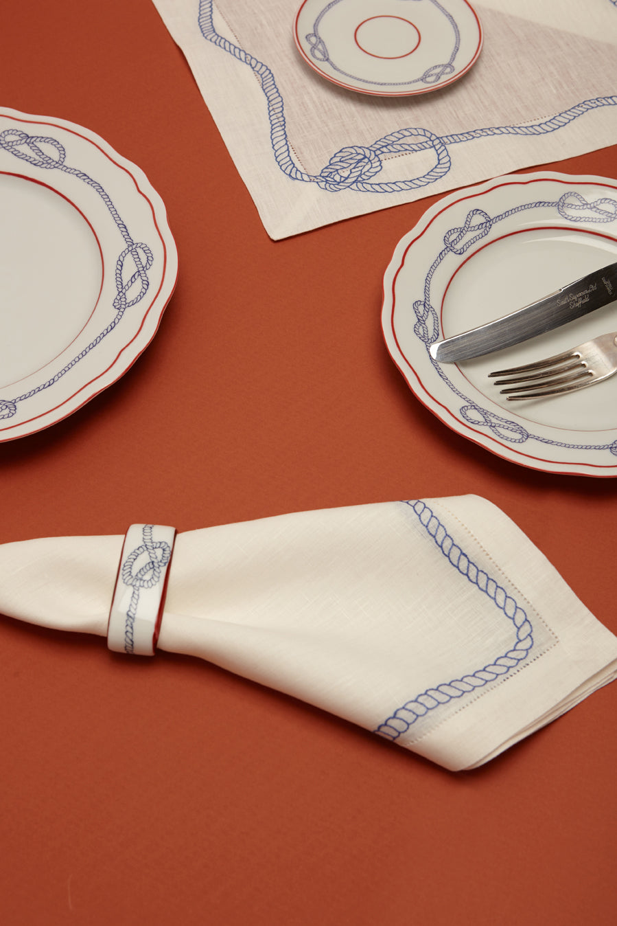 Bowline Linen Napkin in White with Navy