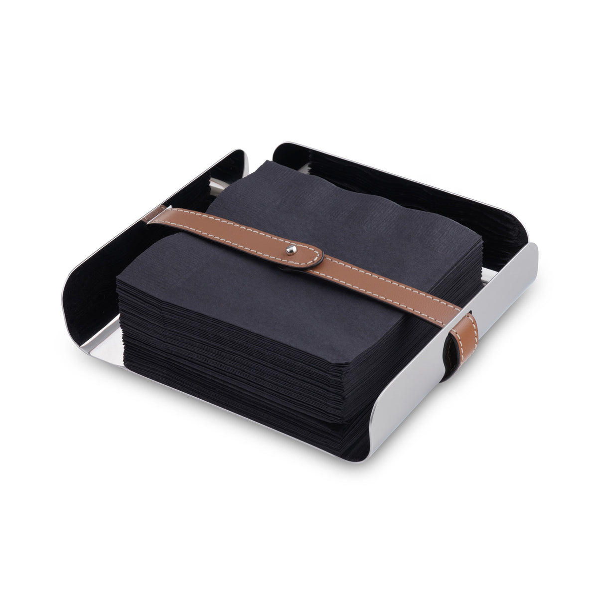 Angled view of Tahoe Napkin Holder showcasing high shine stainless steel, brown leather accent, and black napkins on white