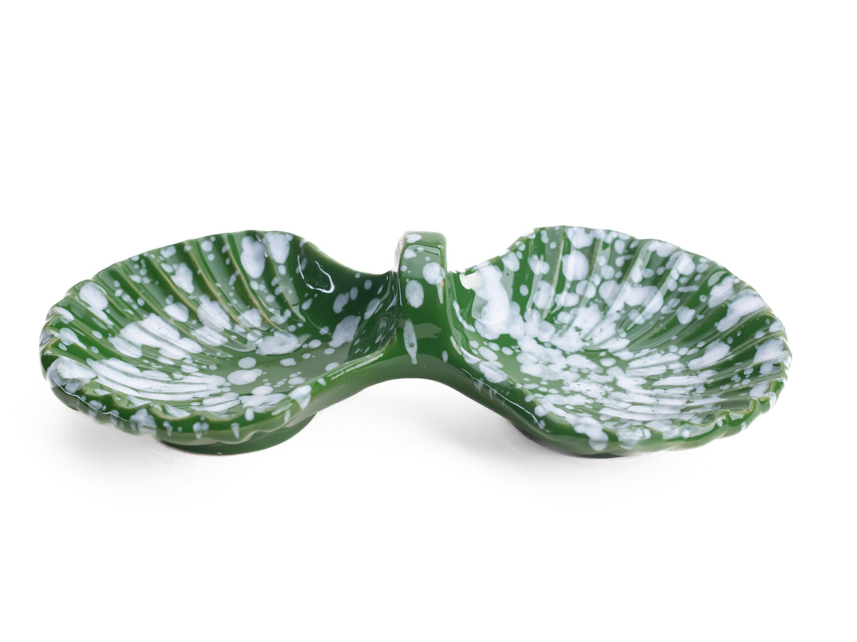 Close-up of Anais Double Concha Green showcasing hand-painted glaze with a white background