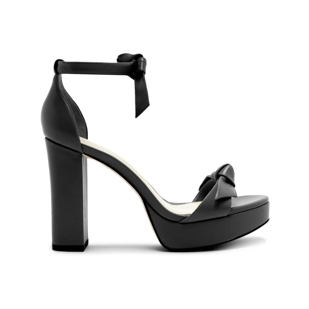 Side view of Mabeleh Platform in black Tucan Leather showcasing bow upper, open toe, platform, and block heel with white background