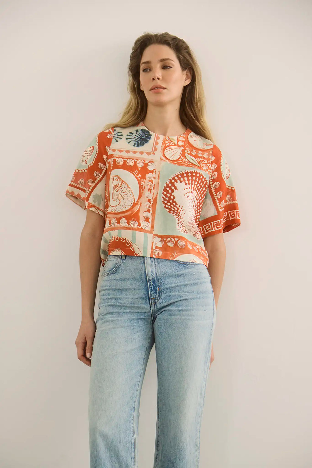 The Maeve Top in lost at sea paired with denim.