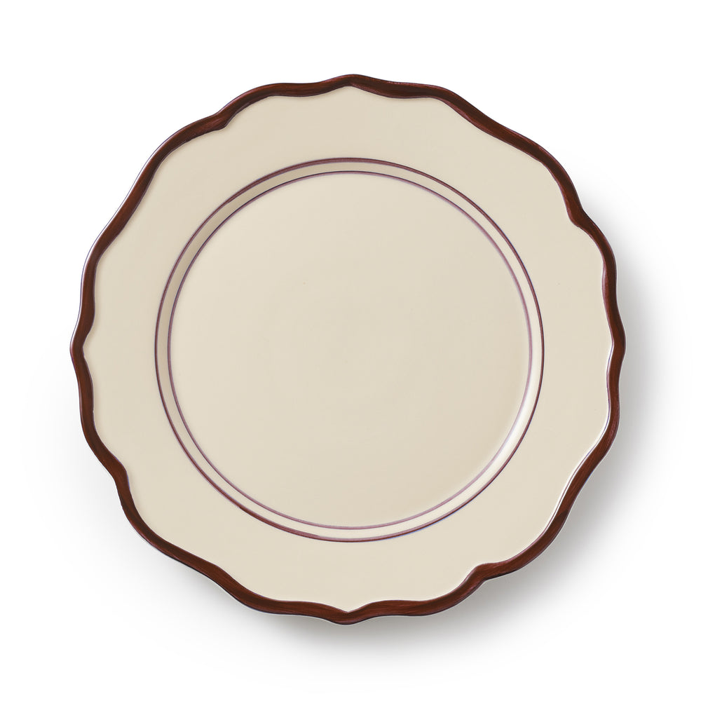 Overhead view of 10.5-inch Darlene dinner plate showcasing scalloped brown rim and double mauve inner rings on a cream background