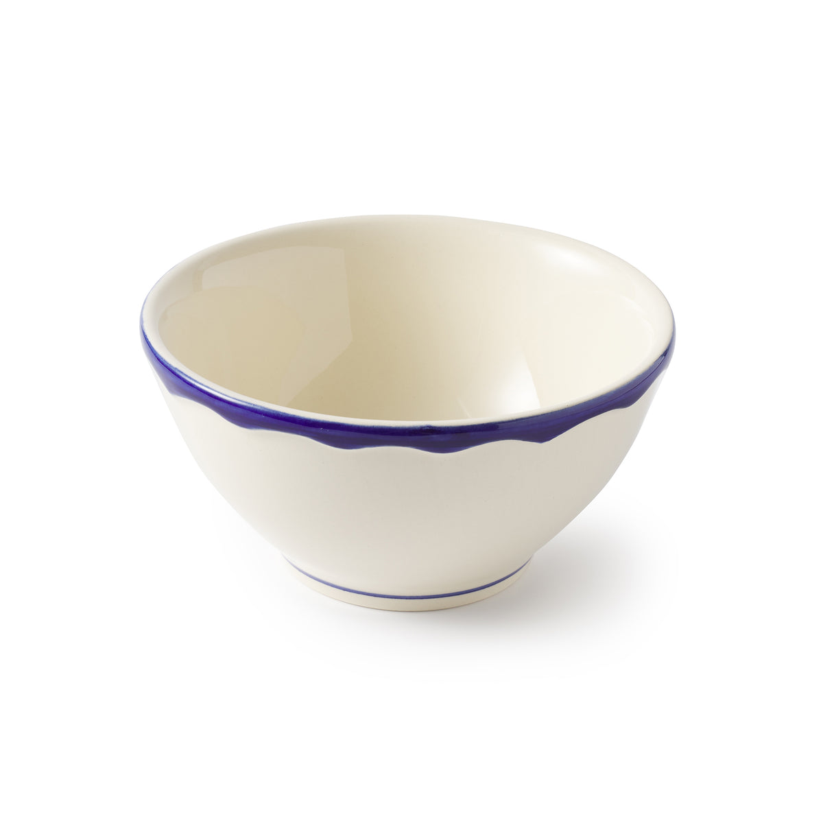 Angled view of Cereal Bowl, Set of 4 showcasing its undulating sea-blue rim with a white background