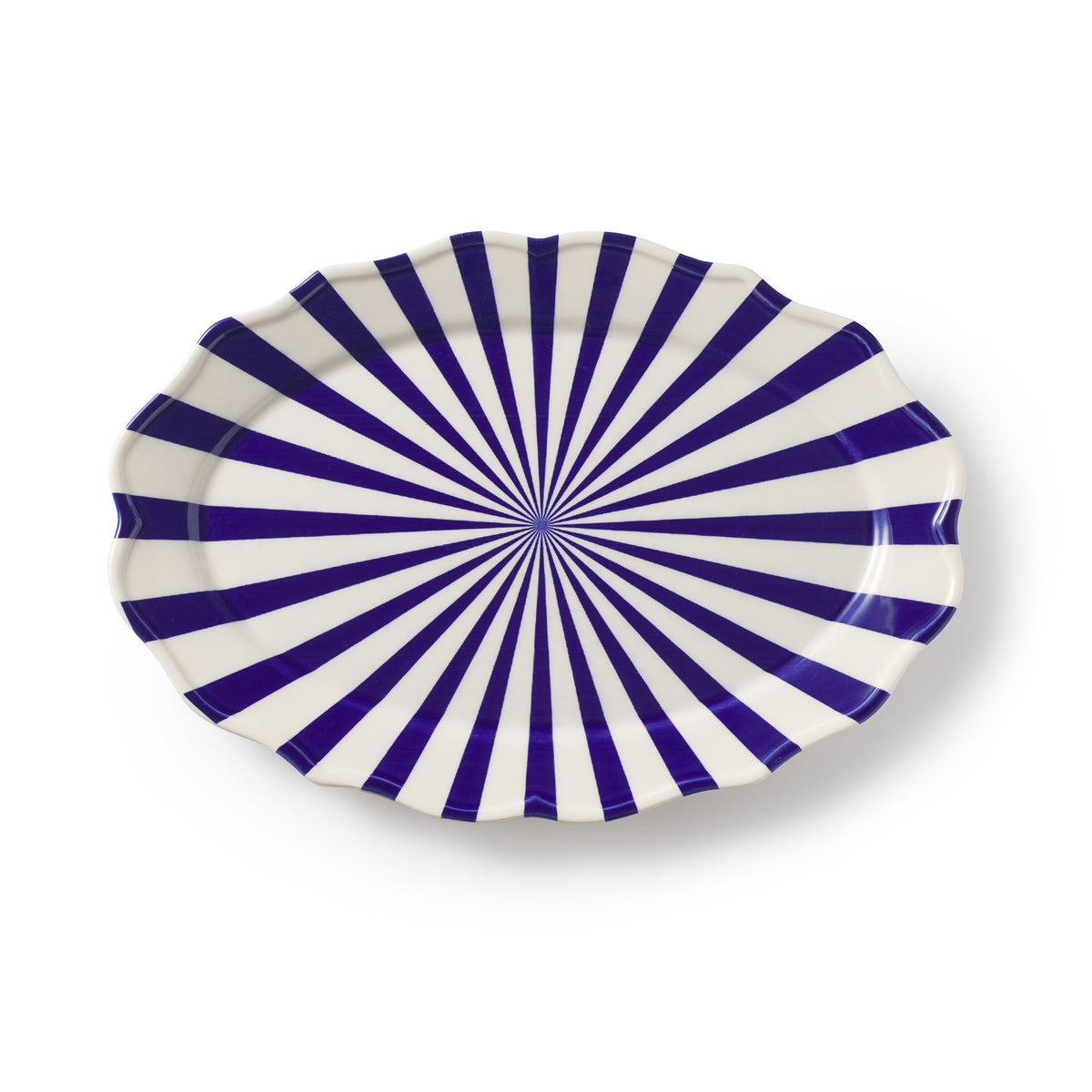 Top view of Mafalda oval platter showcasing blue and white radial stripe pattern and scalloped edge on white background