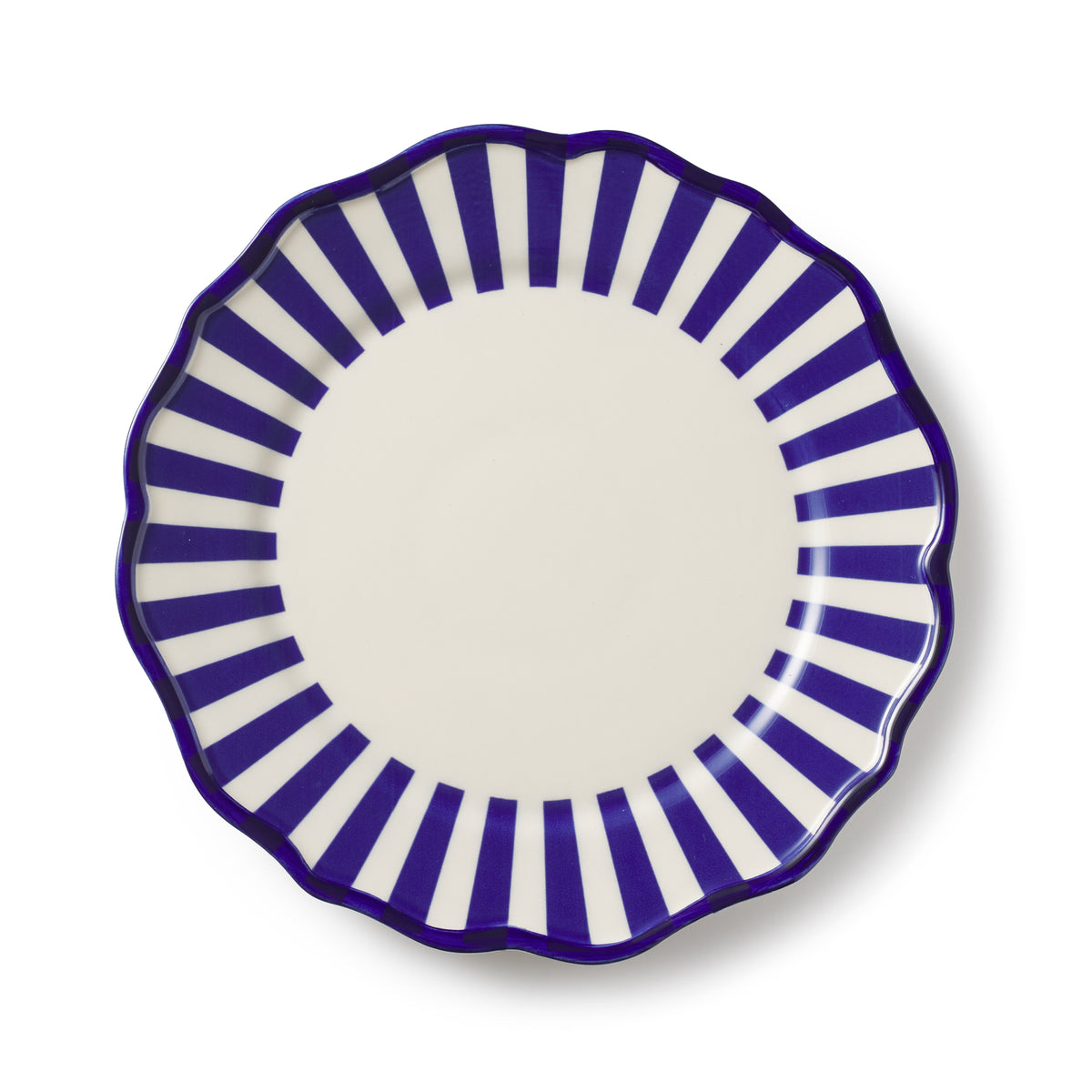Top view of Riviera Dinner Plate, Set of 4 showcasing blue and white symmetrical stripes with a scalloped rim on a white background