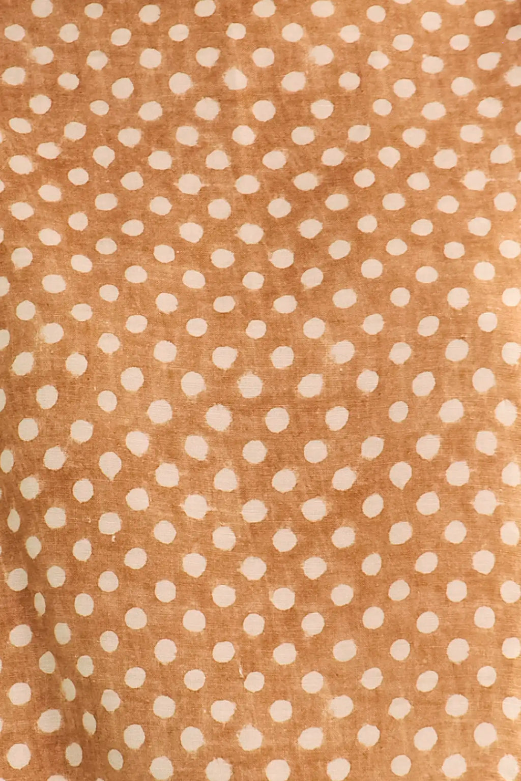 Close up of The Cunningham pant in Coconut Sand Dot.