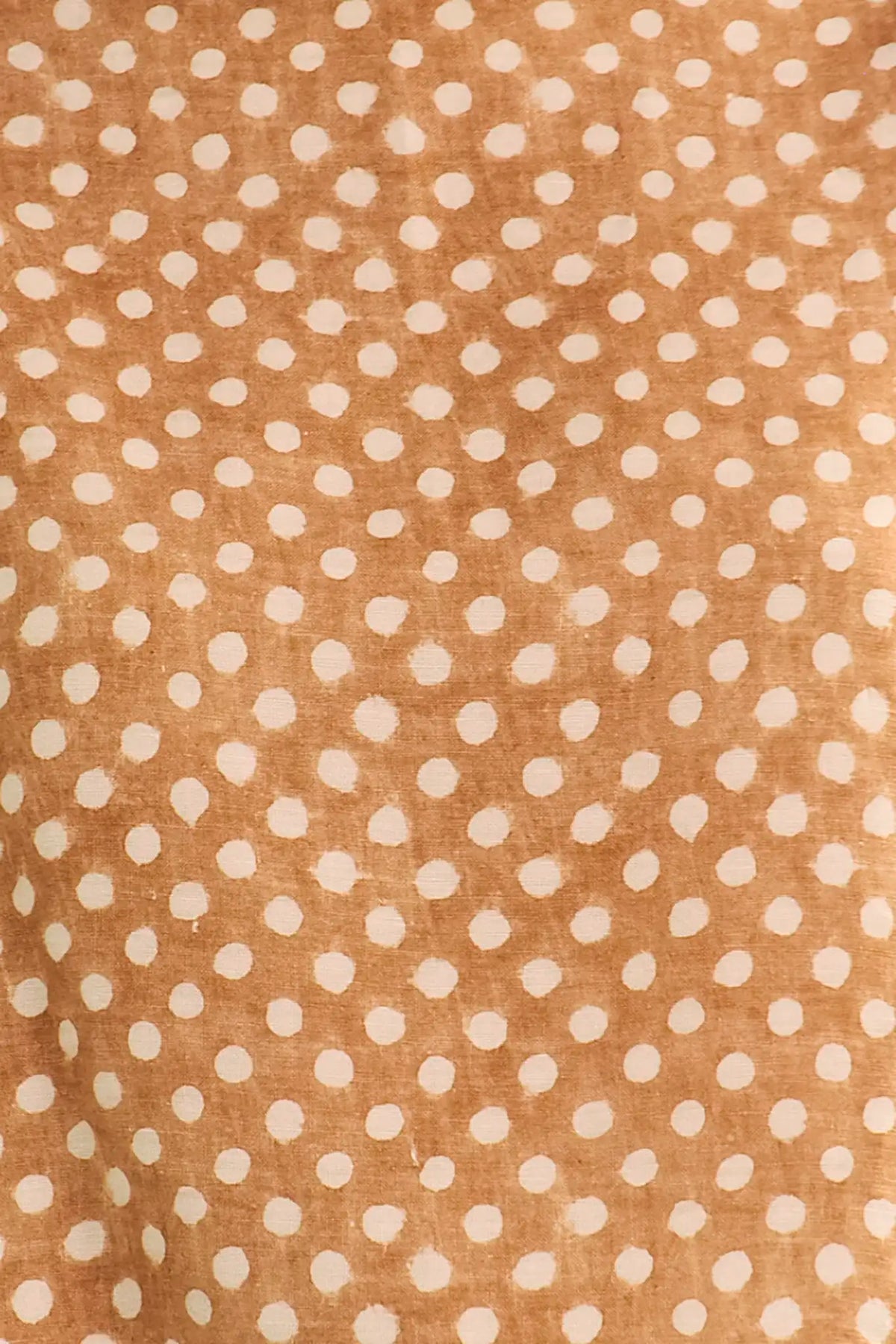 Close up of The Cunningham pant in Coconut Sand Dot.