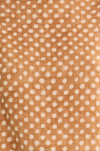 Close up of The Cunningham pant in Coconut Sand Dot.
