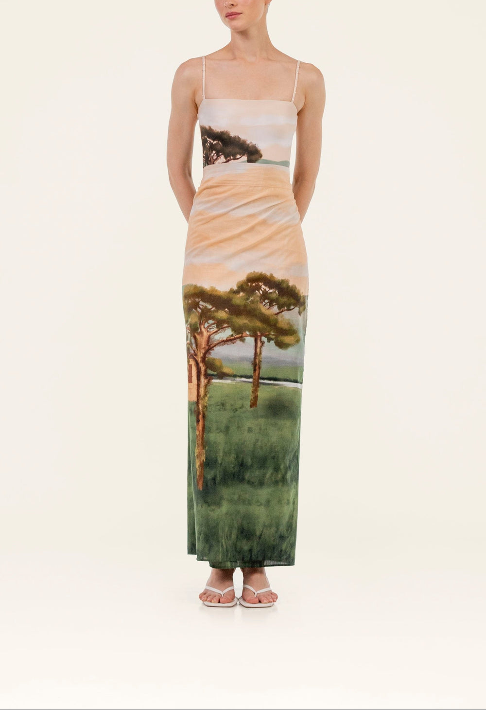 Front view of Lavanda Paraiso Midi Pareo showcasing landscape placement print and midi wrap silhouette on model