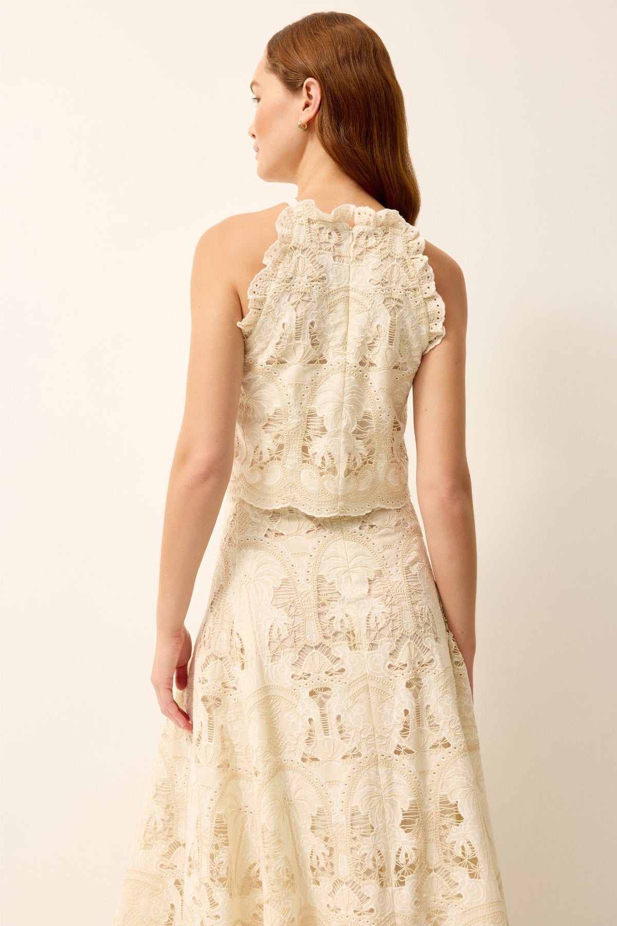 Cream halter top with ruffle trim 