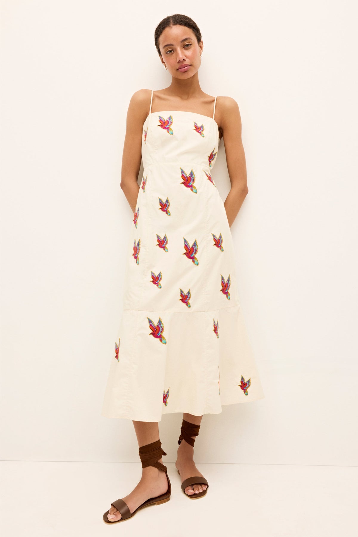 White midi dress with thin straps and red bird embroidery detail 