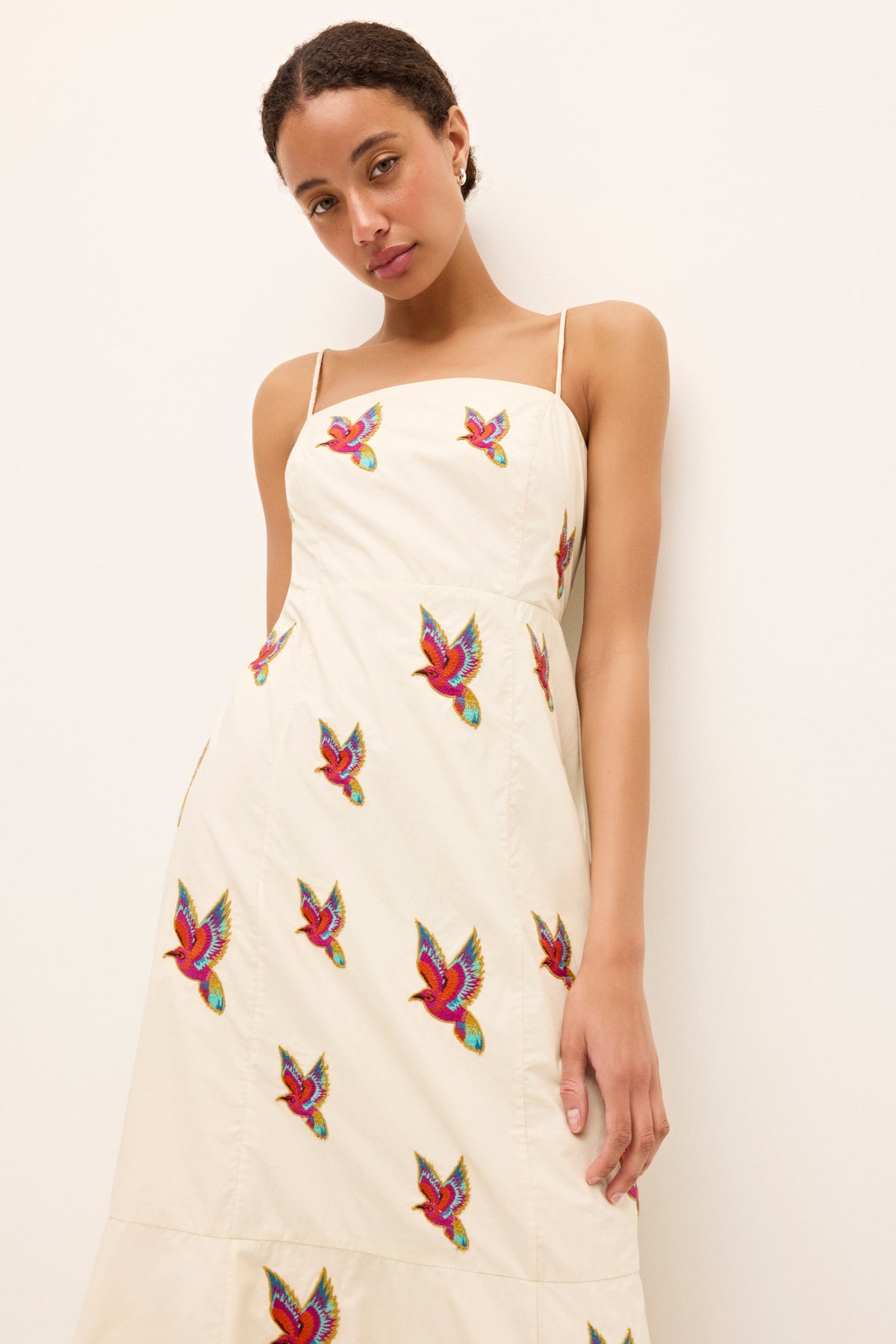 Sleeveless ivory sundress with allover embroidered tropical bird motifs 
