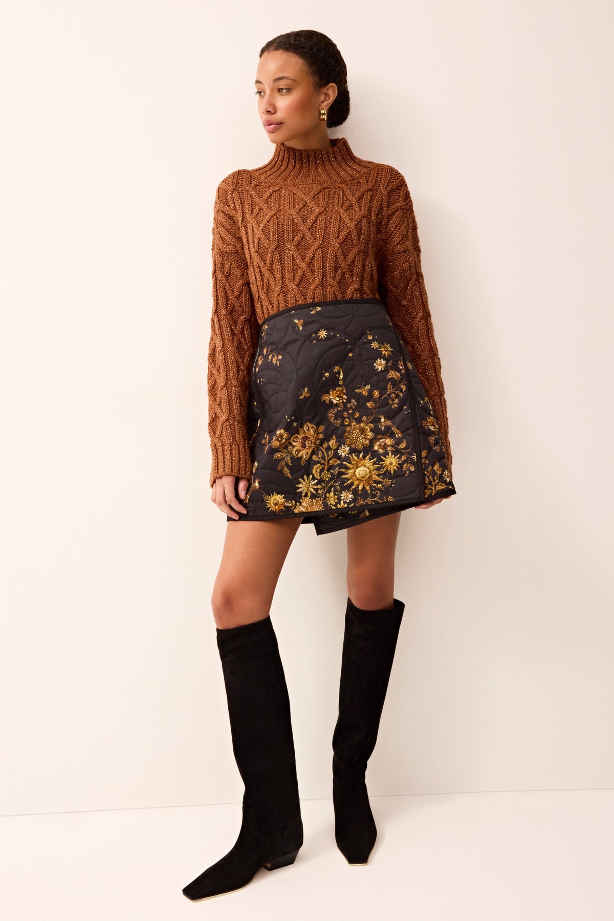 Quilted mini wrap skirt featuring a reversible design.