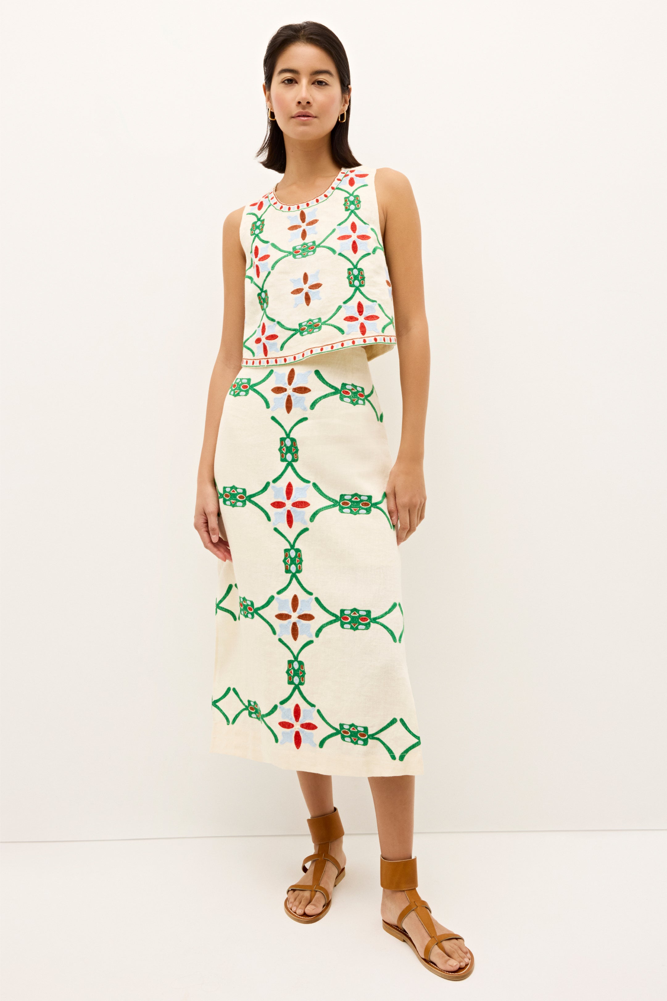 Ivory embroidered skirt with colorful geometric floral patterns and a straight silhouette