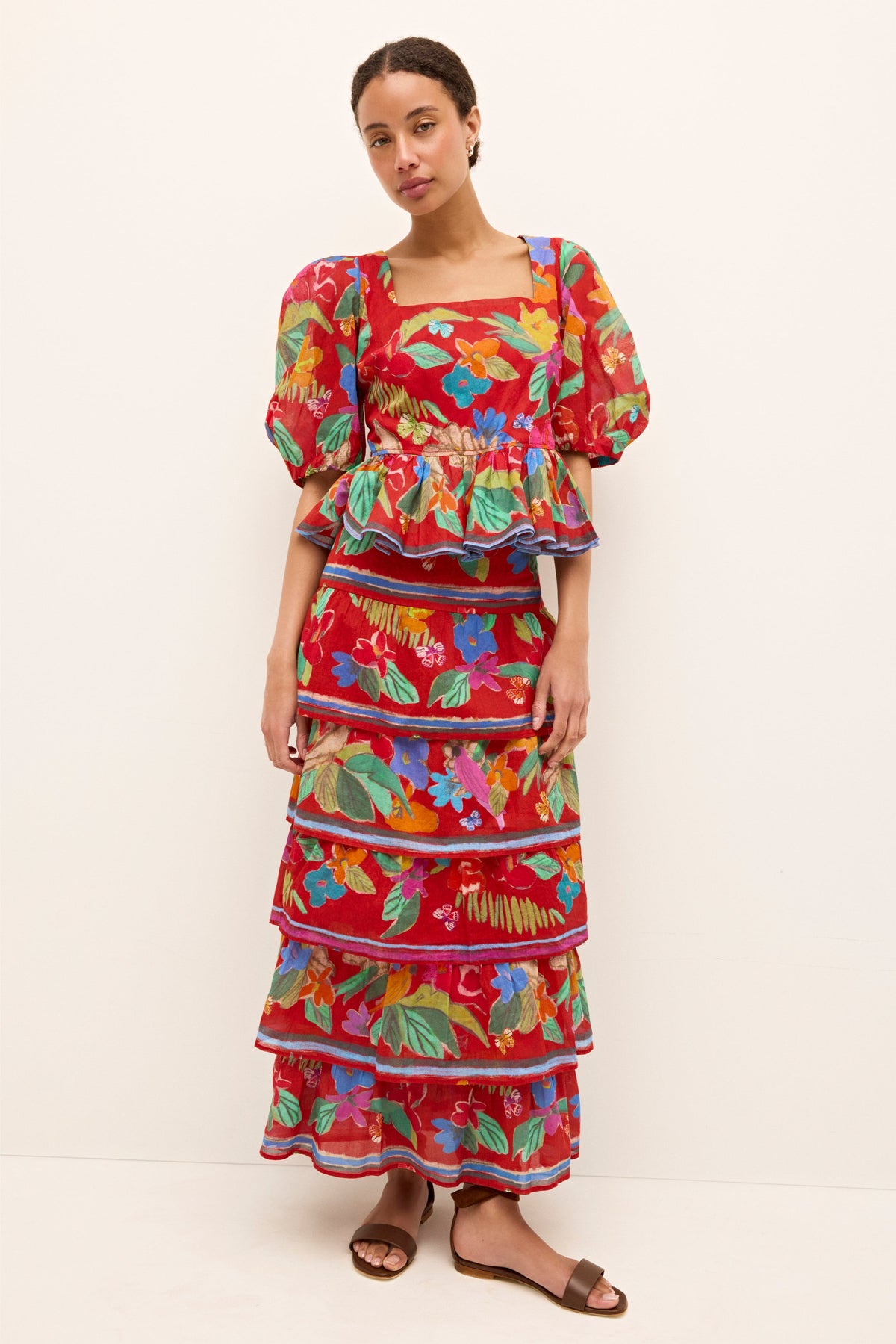 Tiered maxi skirt with vibrant floral print in bold tropical hues 