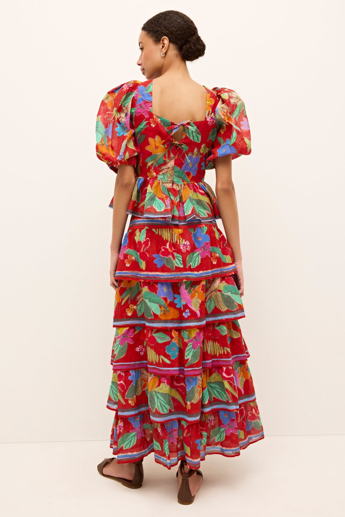 Tropical floral print skirt with voluminous tiers and bohemian flair 