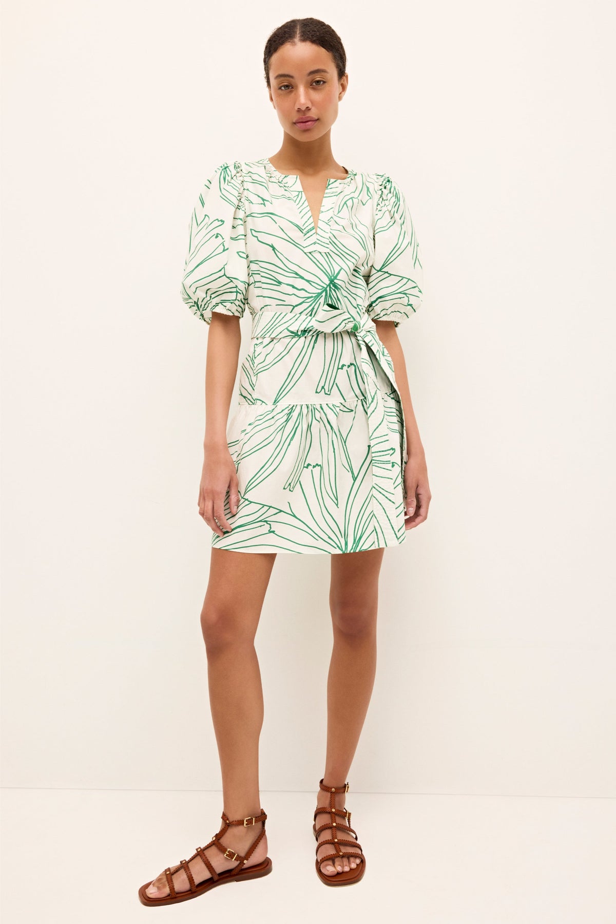 Lightweight short sleeve dress with allover green botanical print and belted waist