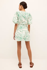 Breezy A-line dress in white with oversized green palm print and tie belt
