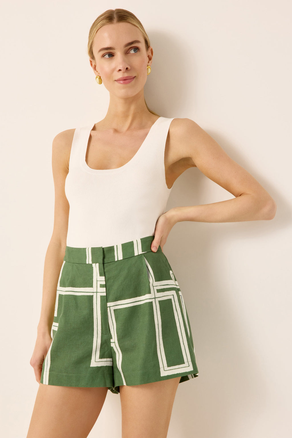 Green and white geometric printed short with elastic back paired with an ivory knit tank