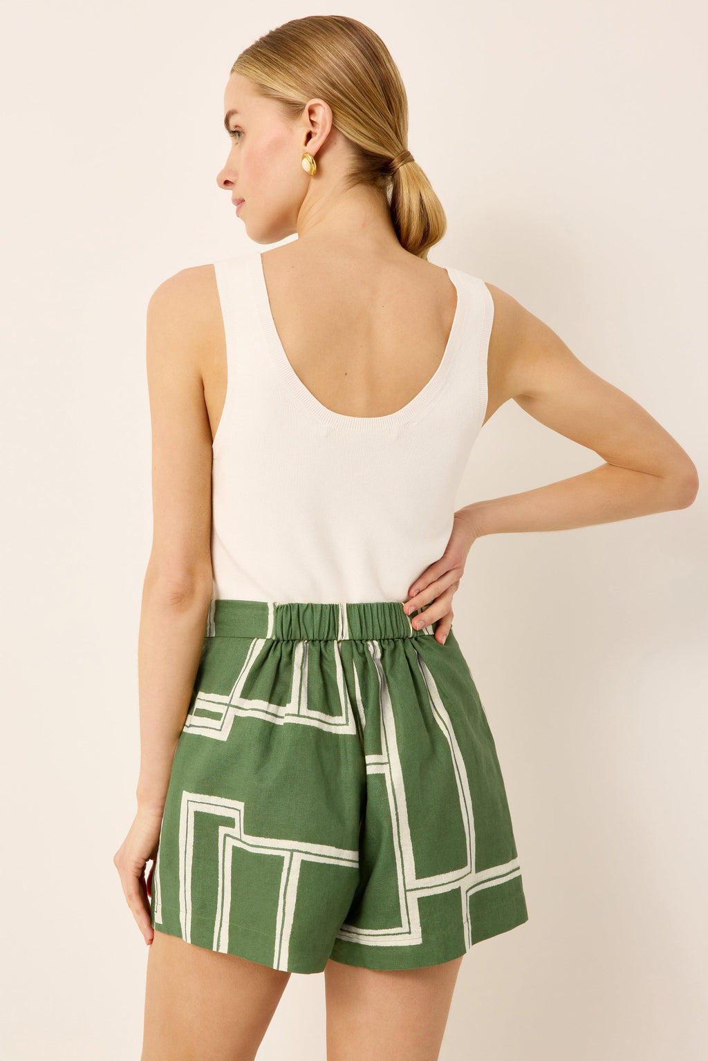 High waisted green and white short with a relaxed fit ivory tank