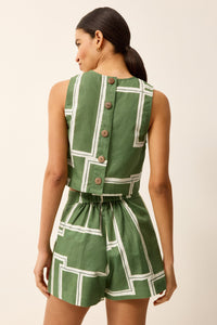 Boxy fit top with a green and white abstract print