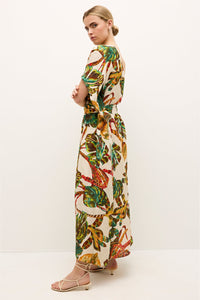 Sleeveless printed dress with gathered detailing and rich earthy hues 