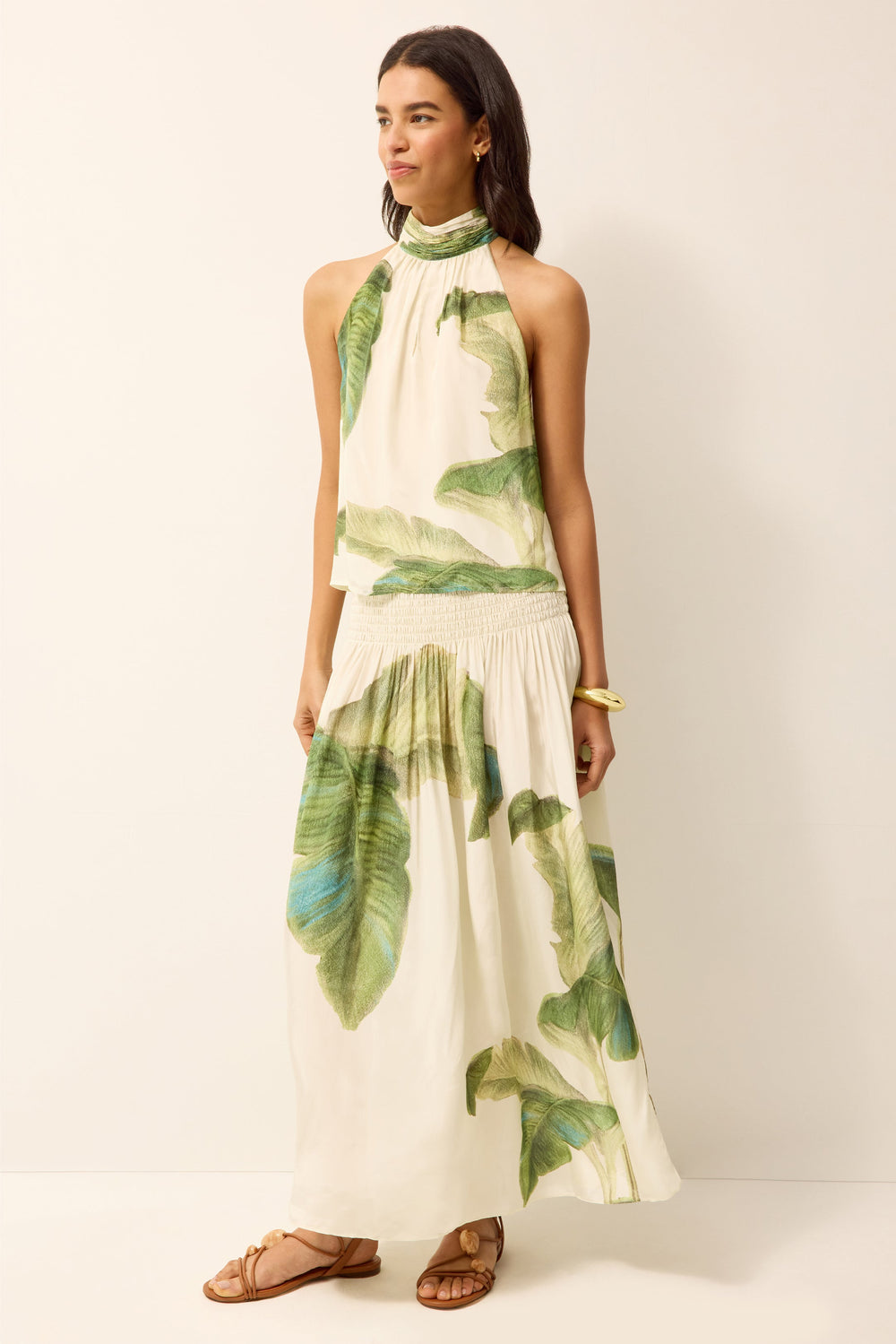 Green and white halter neck blouse with center back slit and matching smocked waist midi skirt