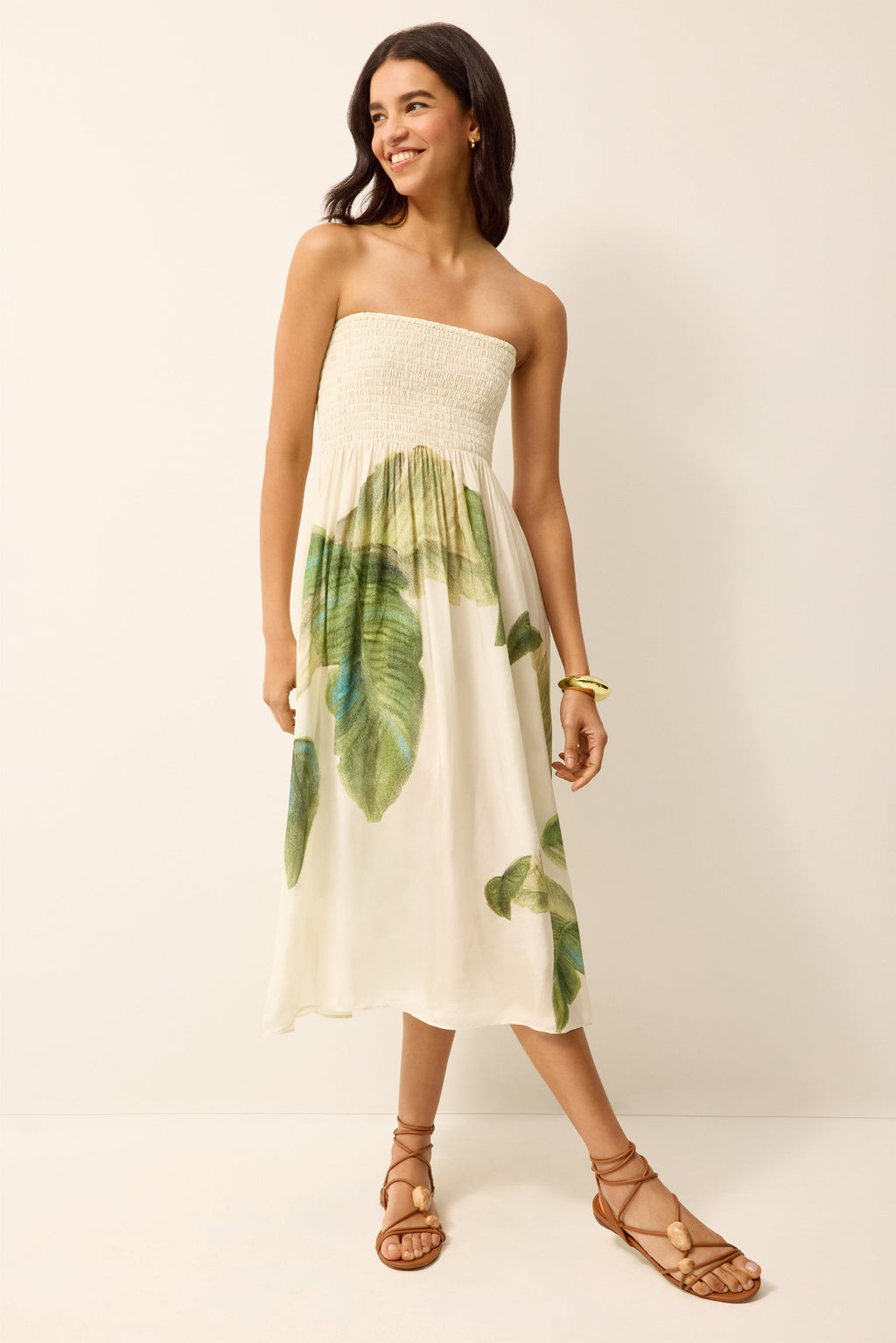 Strapless smocked top dress with green and white palm leaves