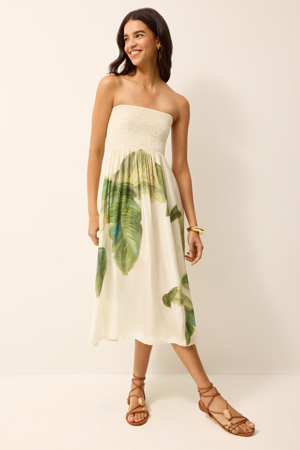 Strapless smocked top dress with green and white palm leaves