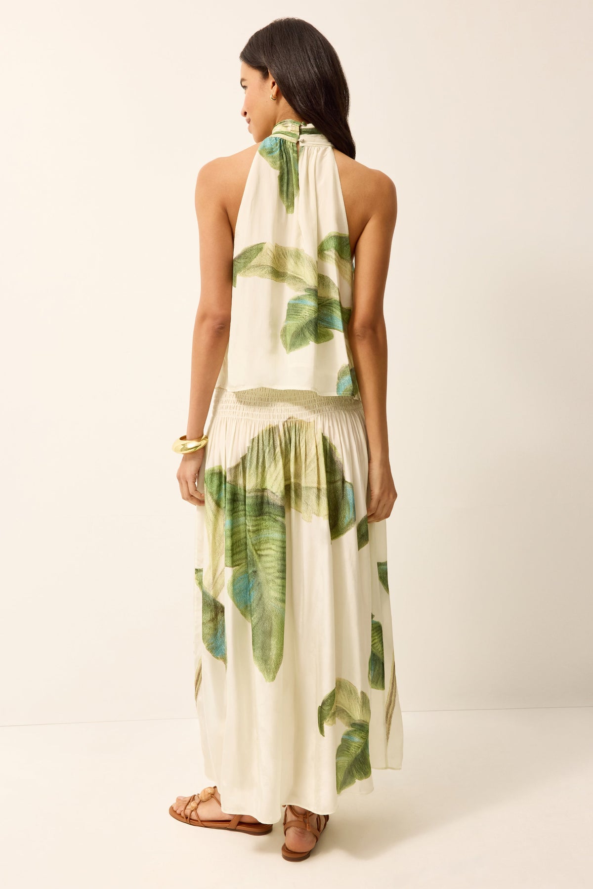 Collar halter neck blouse with a green and white tropical print and matching midi skirt