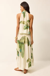 Collar halter neck blouse with a green and white tropical print and matching midi skirt