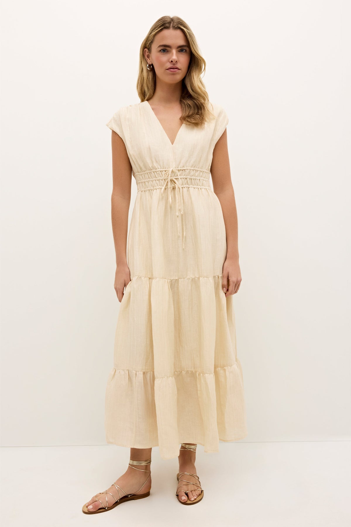 Cream tiered maxi dress with cap sleeves and cinched waist tie 