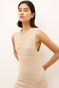 Minimalist sleeveless dress with crew neckline and lightweight texture