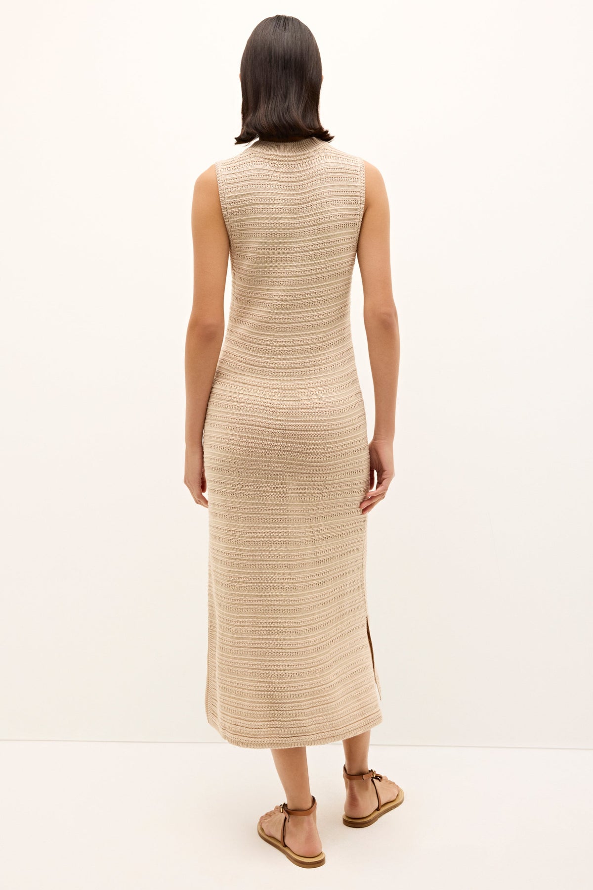 Casual neutral toned midi dress with clean line and and subtle striping 