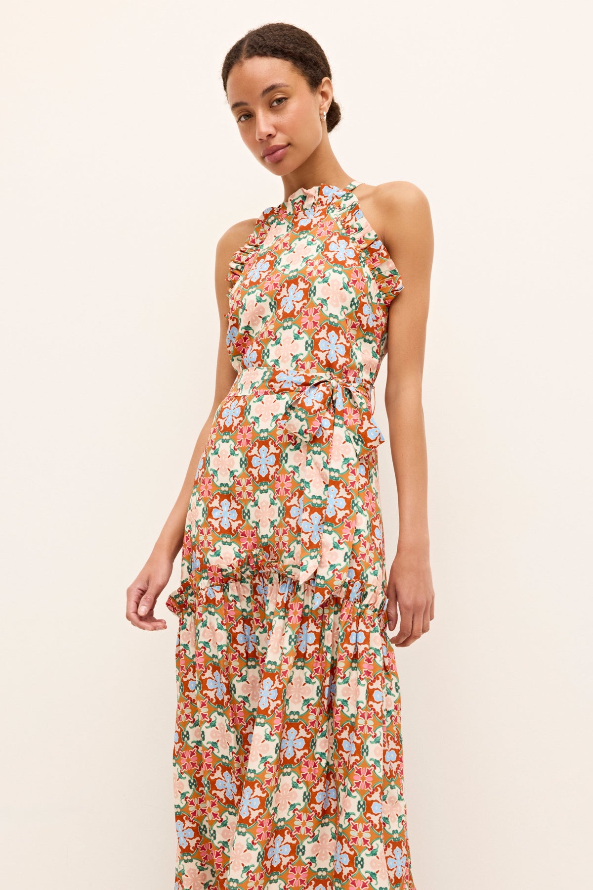 Maxi dress with waist tie detail and intricate symmetrical print in warm hues