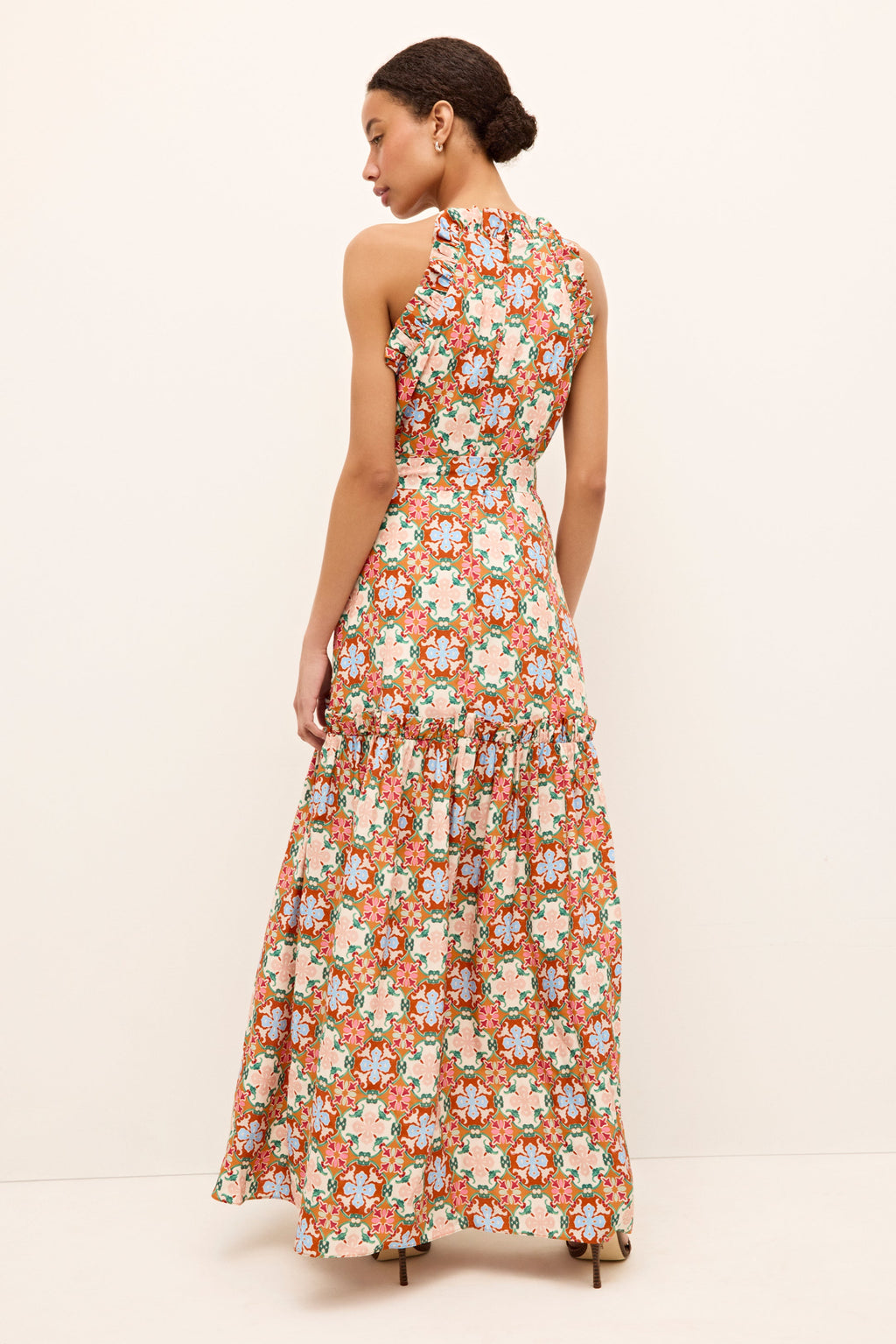 Printed halter neck dress with flared silhouette and playful motif