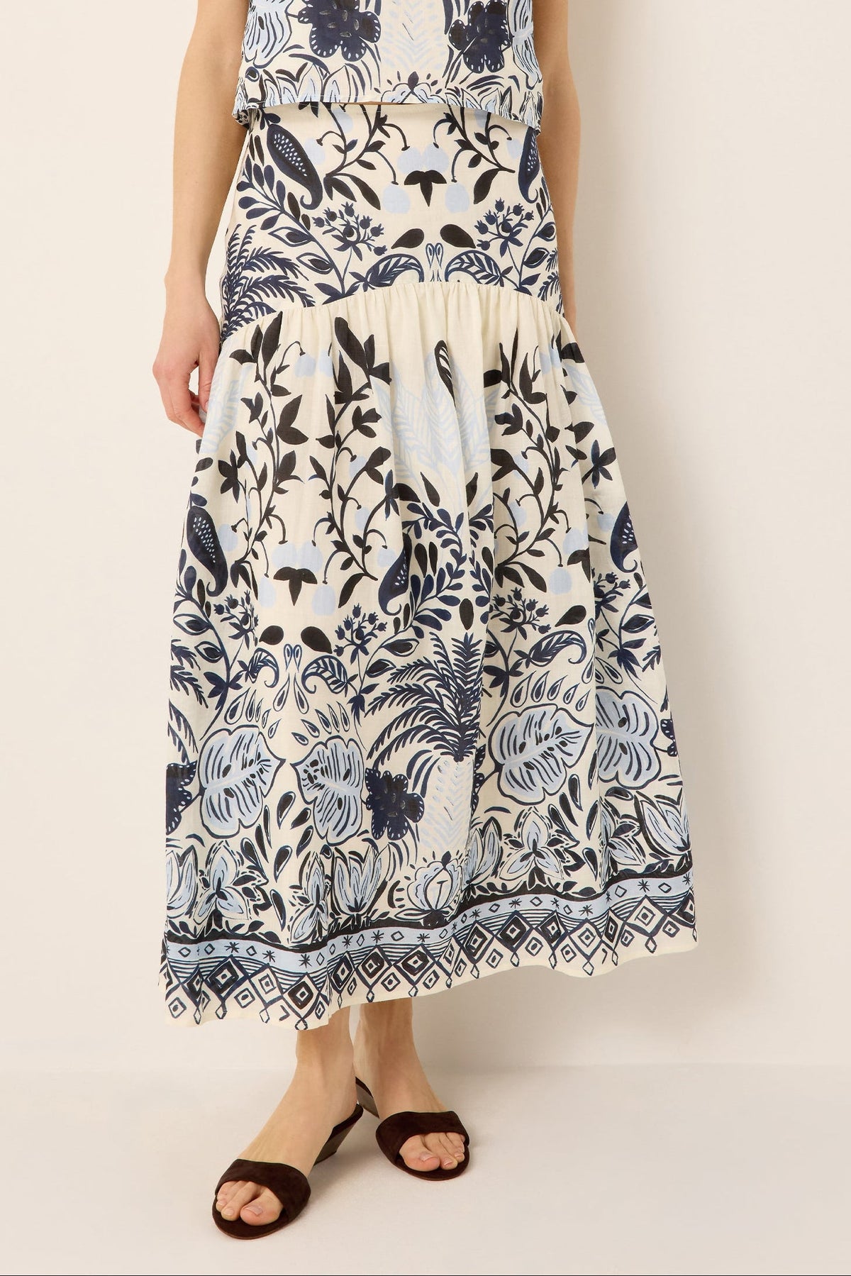 Drop waist blue and white tropical midi skirt