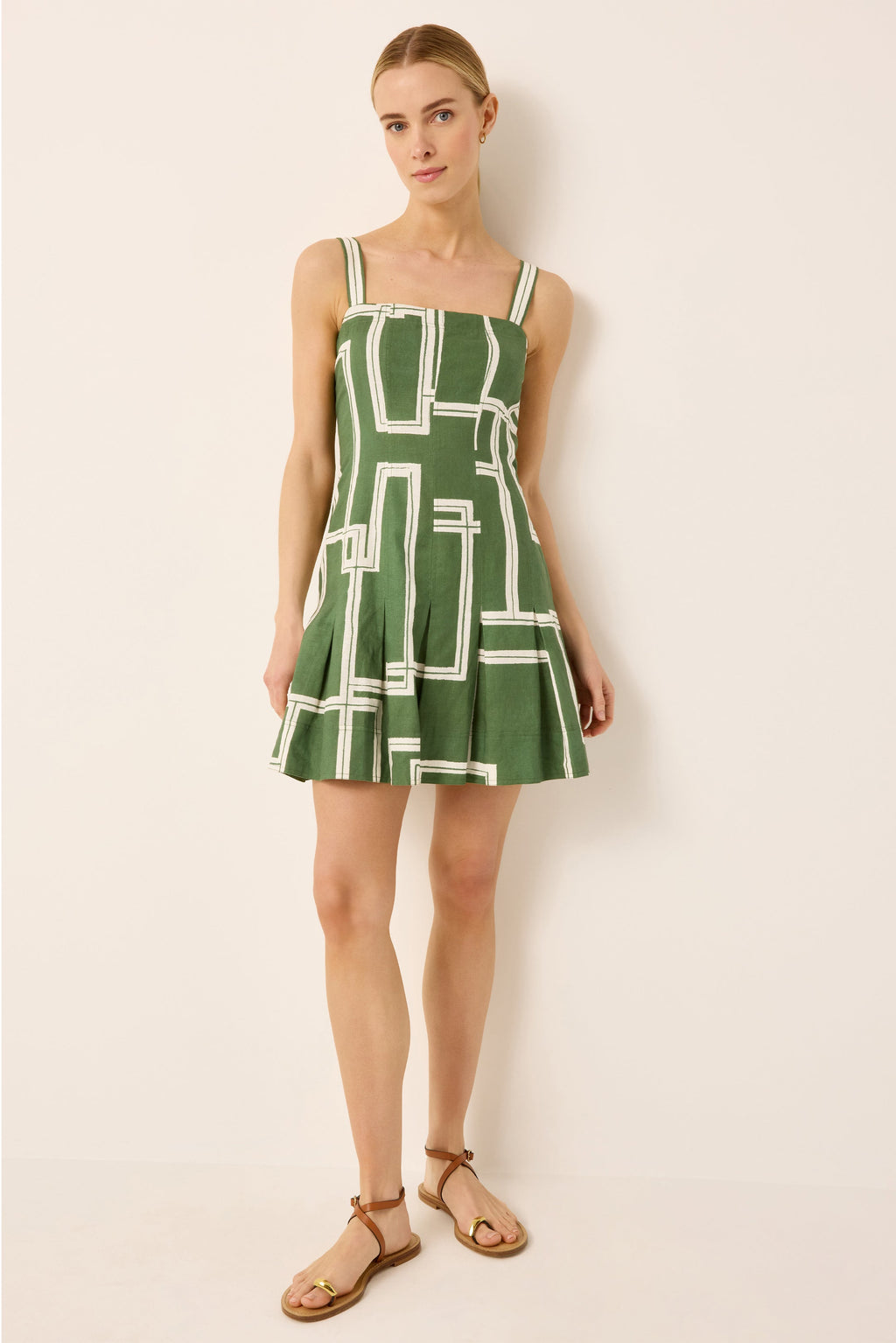 Pleated green and white abstract printed mini dress