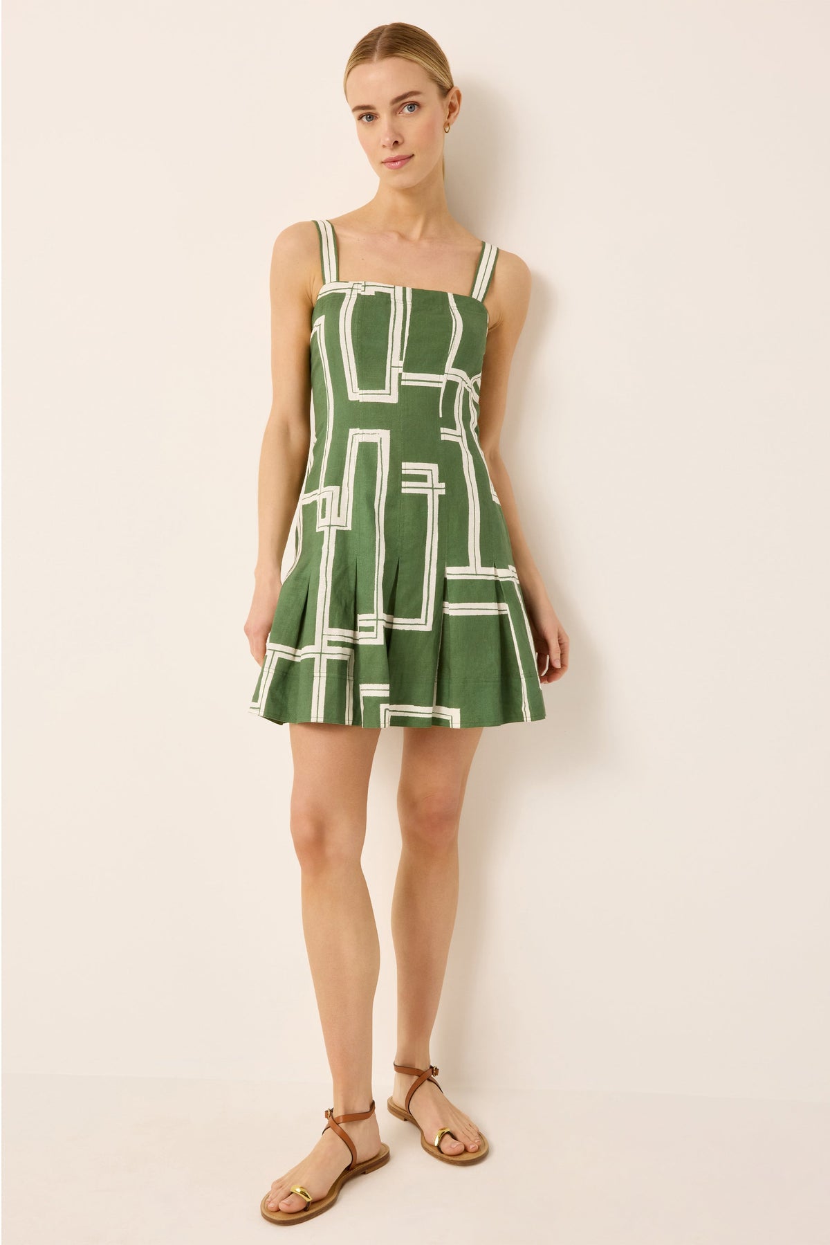 Pleated green and white abstract printed mini dress