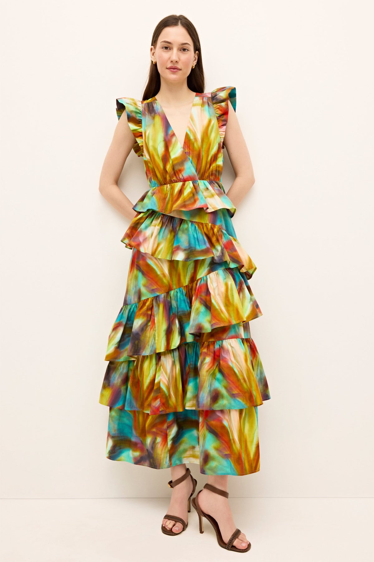 Vibrant ruffled maxi dress with a plunging neckline and multi-tiered skirt 